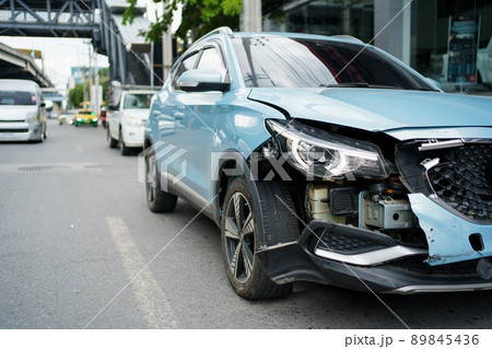 Front of the modern vehicle have a heavy - major damaged. Car crash - accident on the road. Front of the modern vehicle have a heavy - major damaged. Car crash - accident on the road. 89845436