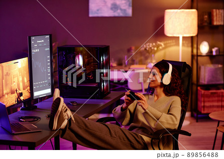 Young Adult Woman Enjoying Game 89856488