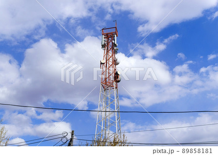 Telecommunication tower, antenna and satellite dish, wireless signal and banking services. The concept of connecting to an online service 89858181