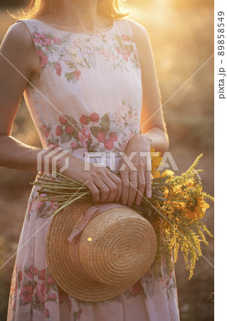 girl in the field at sunset girl in the field at sunset 89858549