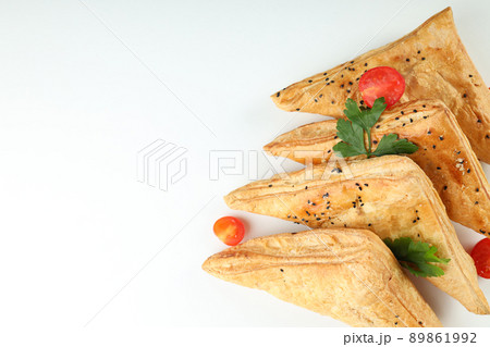 Concept of tasty food with samsa on white background Concept of tasty food with samsa on white background 89861992