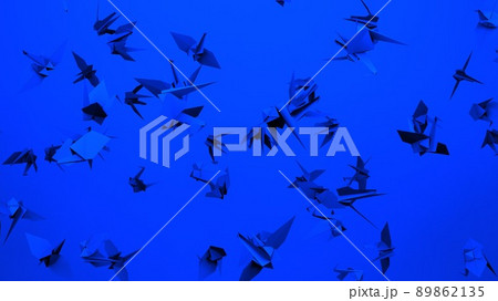 Blue origami crane on blue background. 89862135
