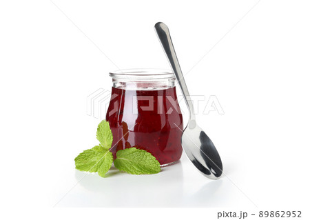 Jar of raspberry jam isolated on white background 89862952