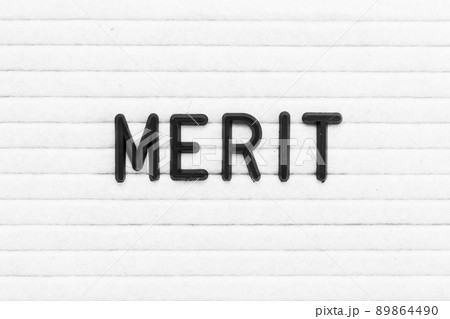 Black color letter in word merit on white felt board background Black color letter in word merit on white felt board background 89864490