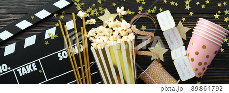 Concept of cinema accessories on wooden background 89864792