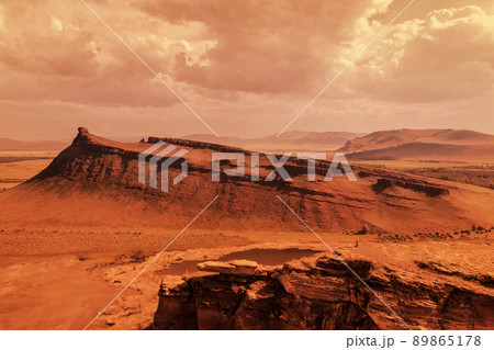 extraterrestrial landscape, mountains and hills on the red orange planet Mars, cosmic expanses fantastic unreal landscapes futuristic planet 89865178