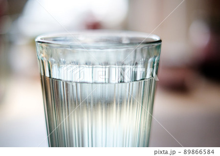 Glass of still water. Defocused Glass of still water. Defocused 89866584