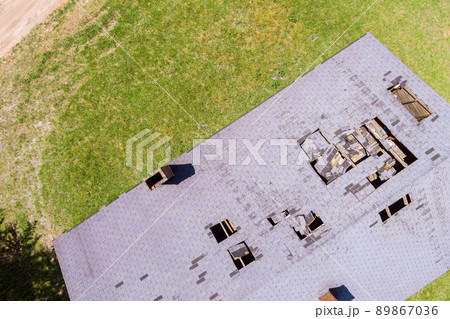 Removal of damaged roof, replacement with rural house residential rooftop 89867036