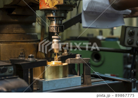 The drilling process on NC milling machine. 89867775