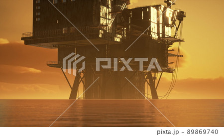 old oil platform during sunset in ocean 89869740