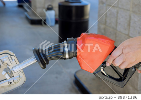 Refill filling oil gas fuel at station refueling to fill the machine Refill filling oil gas fuel at station refueling to fill the machine 89871386