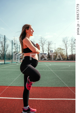Prenatal gymnastics. Pregnant woman training yoga sport exercise. Prenatal healthy fitness active fit gym outside. Pregnancy fitness. 89873779