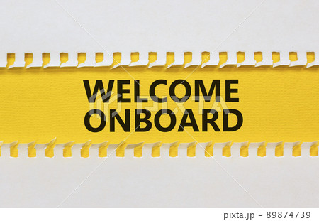 Welcome onboard and support symbol. Concept words Welcome onboard on yellow paper on a beautiful yellow table white background, copy space. Business and Welcome onboard concept. Welcome onboard and support symbol. Concept words Welcome onboard on yellow paper on a beautiful yellow table white background, copy space. Business and Welcome onboard concept. 89874739