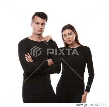 Couple wearing thermal underwear isolated on white 89875066
