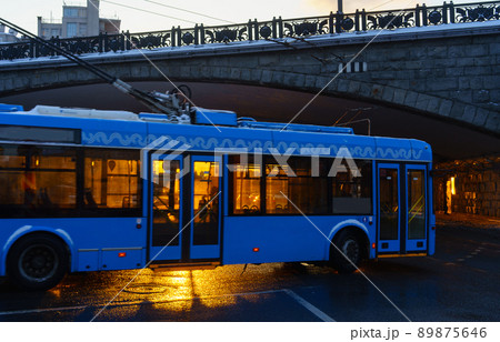 Blue bus on a street in Moscow. 89875646