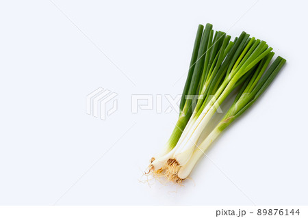 Spring onions on white background 89876144