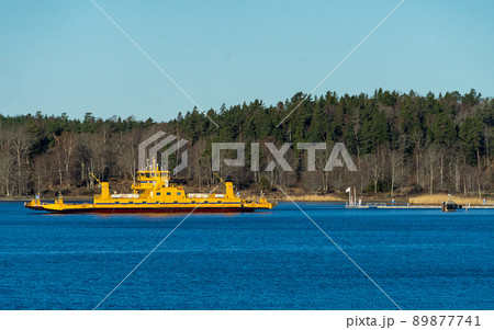 Yellow ferry for transporting cars and people from the islands of the Stockholm archipelago to the mainland Yellow ferry for transporting cars and people from the islands of the Stockholm archipelago to the mainland 89877741