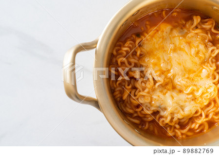 Korean spicy instant noodle with cheese 89882769