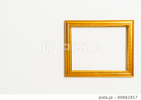 empty picture frame on white wall background 89882857