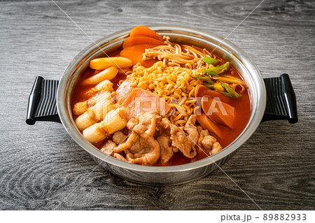 Budae Jjigae or Budaejjigae (Army stew or Army base stew). It is loaded with Kimchi, spam, sausages, ramen noodles and much more 89882933