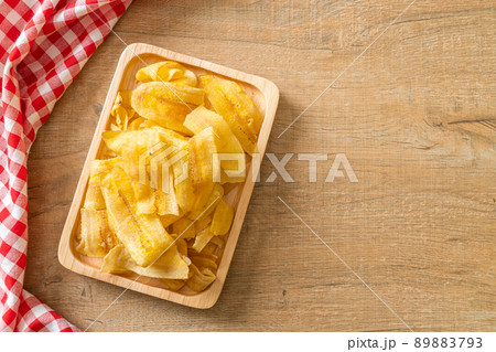 Banana Chips - fried or baked sliced banana 89883793