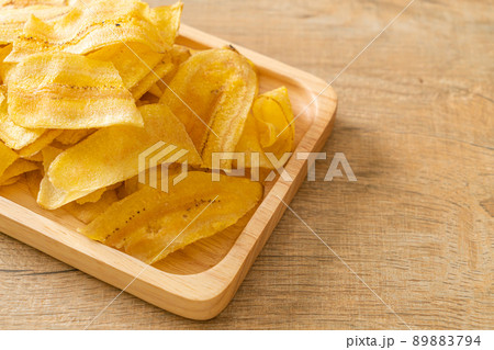 Banana Chips - fried or baked sliced banana 89883794