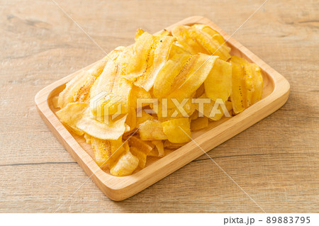 Banana Chips - fried or baked sliced banana 89883795