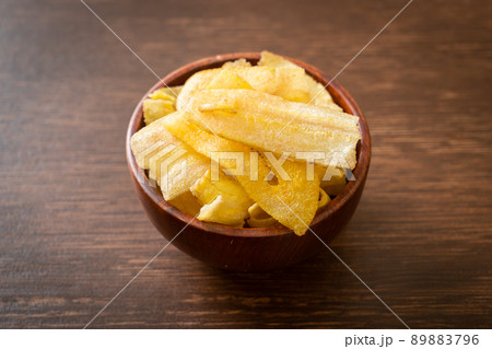 Banana Chips - fried or baked sliced banana 89883796