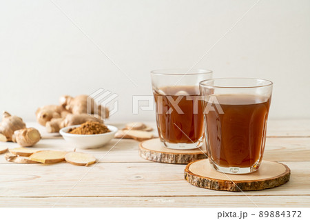 hot and sweet ginger juice glass 89884372