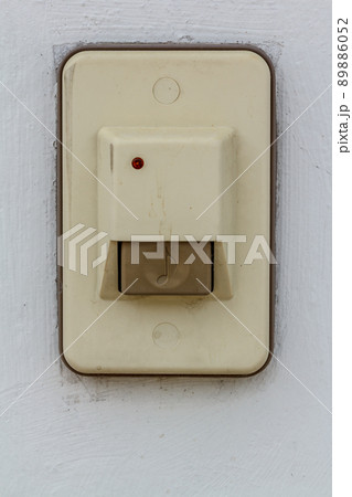 Close up doorbell in front of home Close up doorbell in front of home 89886052
