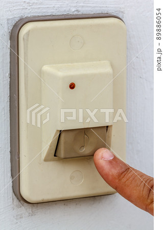 Close up doorbell in front of home Close up doorbell in front of home 89886054