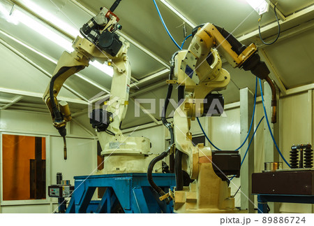 Robots welding in parts industry Robots welding in parts industry 89886724