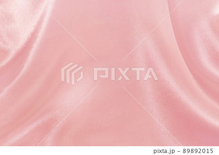 Rose gold fabric cloth texture for background and design art work, beautiful crumpled pattern of silk or linen. 89892015