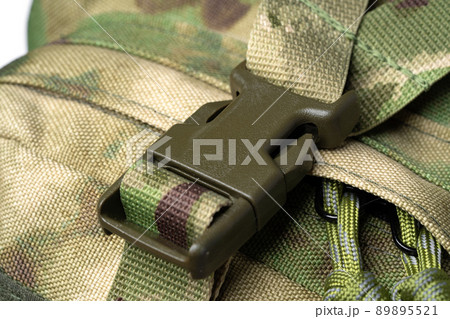 Close up still life of a green army tactical backpack Close up still life of a green army tactical backpack 89895521