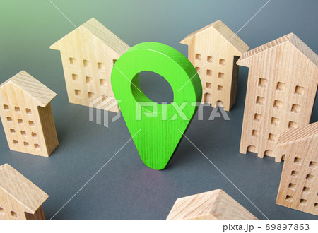 Green location indicator among houses. Delivery. Tracking and navigation. Internet of things, city management and city services municipal. Business advertising. Modern eco living housing. Green location indicator among houses. Delivery. Tracking and navigation. Internet of things, city management and city services municipal. Business advertising. Modern eco living housing. 89897863