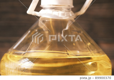 Palm oil in a plastic container close up , Palm oil in a plastic container close up , 89900370