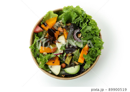 Cardboard bowl with pumpkin salad isolated on white background Cardboard bowl with pumpkin salad isolated on white background 89900519