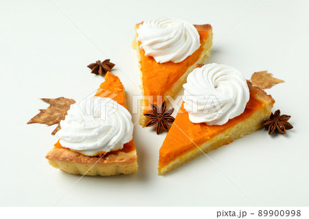 Pieces of pumpkin pie on white background, close up 89900998
