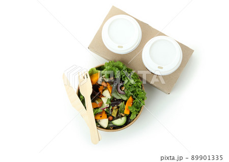 Pumpkin salad and coffee in disposable tableware isolated on white background 89901335