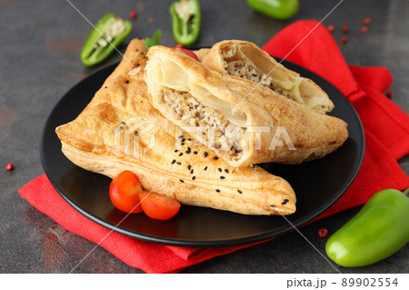 Concept of tasty food with samsa on dark textured background 89902554
