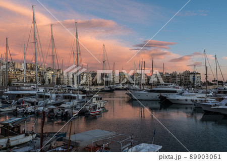 Freattyda, Athens - Greece - Golden hour landscape view over the marina of Piraeus with boats and pink clouds 89903061