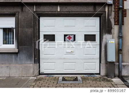Jette, Brussels Capital Region - Belgium -  residential garage port with a no parking sign 89903167