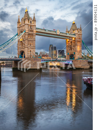 Illuminated Tower Bridge over the River Thames London UK 89904131