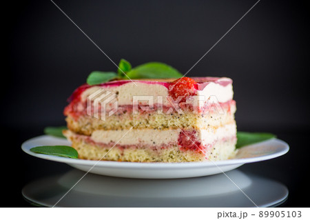 strawberry poppy cake with cream in a plate strawberry poppy cake with cream in a plate 89905103