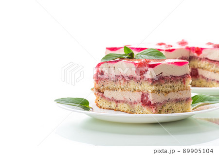 strawberry poppy cake with cream in a plate 89905104