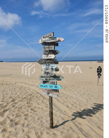 Big colorful Signpost at a beach Big colorful Signpost at a beach 89905715