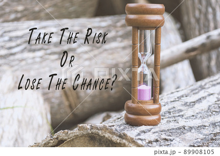 Motivational and inspirational quote with hourglass on tree trunk background. 89908105