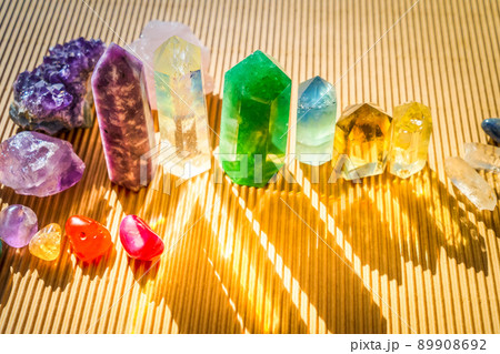 Healing crystals on brown background Healing crystals on brown background 89908692