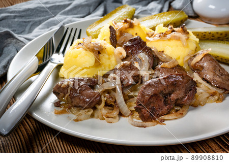 Fried liver with onion. 89908810