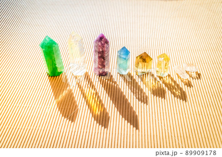 Healing crystals on brown background 89909178
